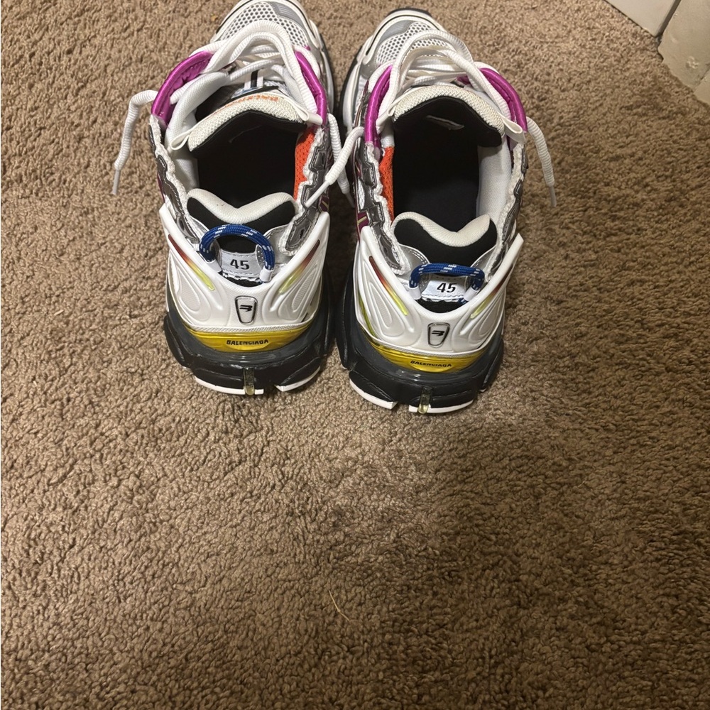 White and Black Sneakers with Purple and Yellow Accents
